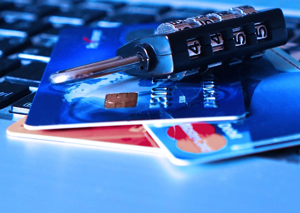 Credit card laying on table with lock image