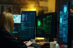 A backview shot of girl sitting on her workstation Image